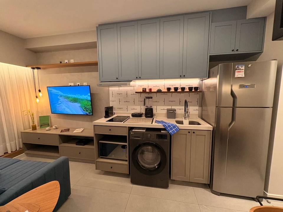 Laundry area integrated into the kitchen for added convenience
