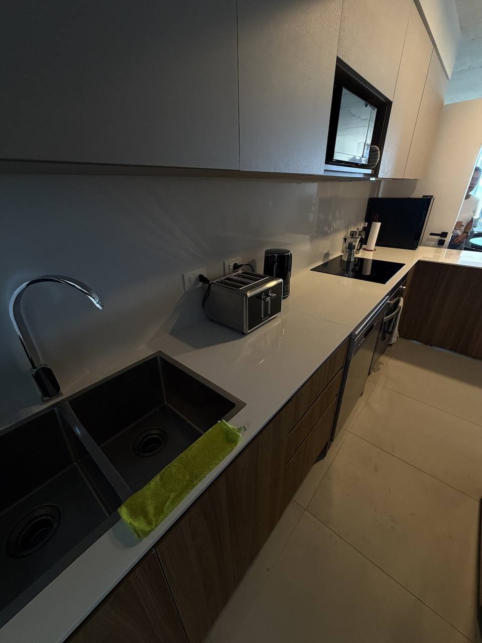 Kitchen with sink, faucet, and appliances