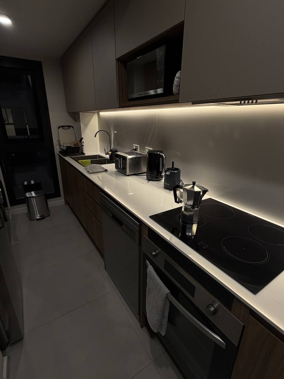 Kitchen with white countertop and appliances