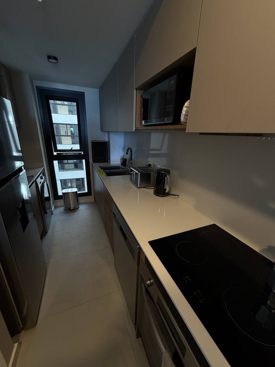Kitchen with stainless steel appliances and counter