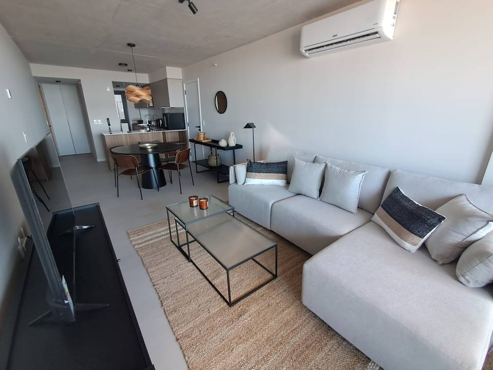 Light modular sofa with cushions