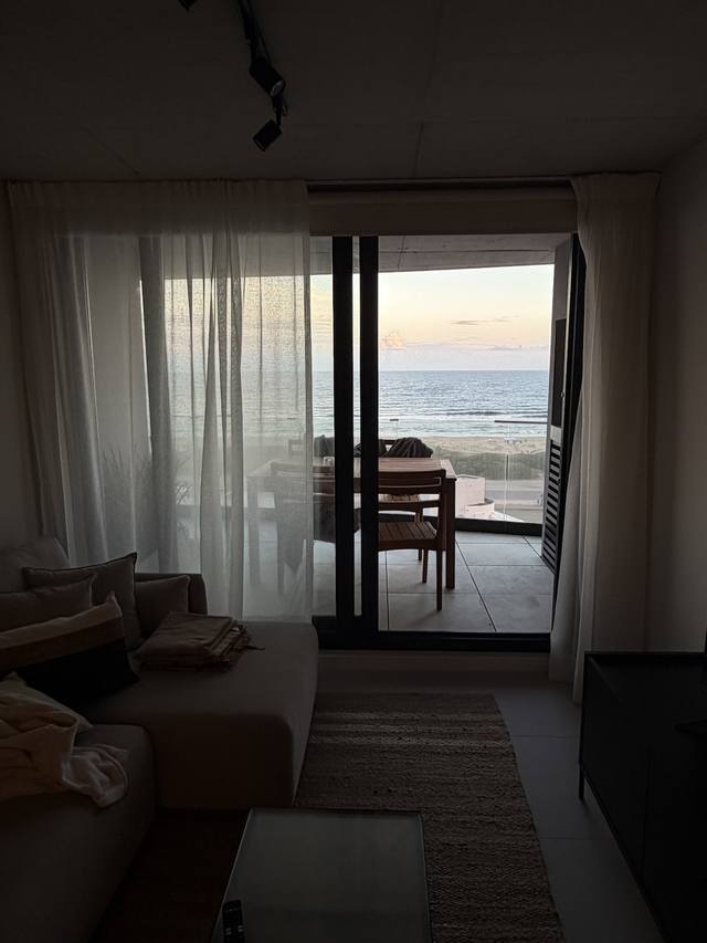 Living room with ocean view balcony