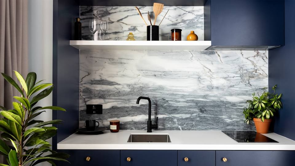 Modern kitchen with marble finishes