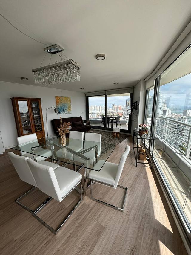 Glass table with six chairs