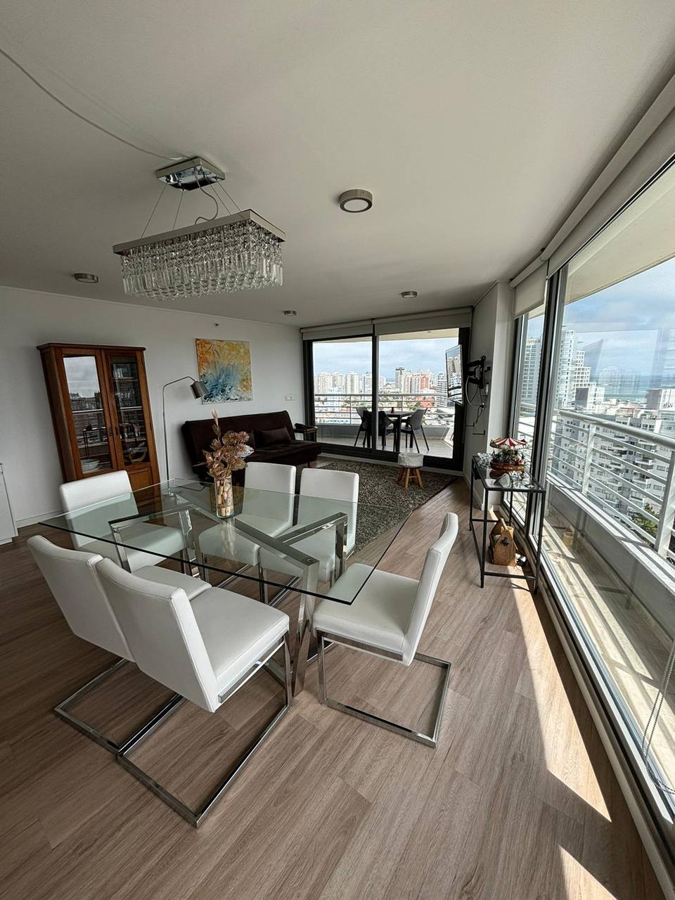 Glass table with six chairs