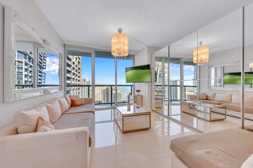 Spacious and bright living room with water views