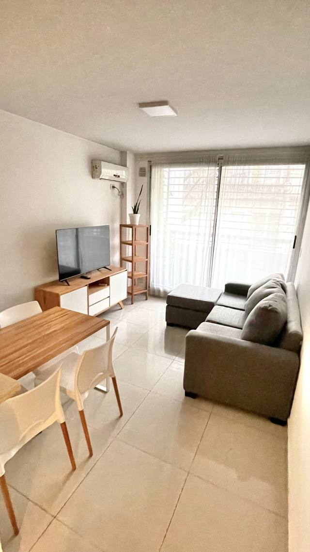 Spacious living-dining room with balcony access