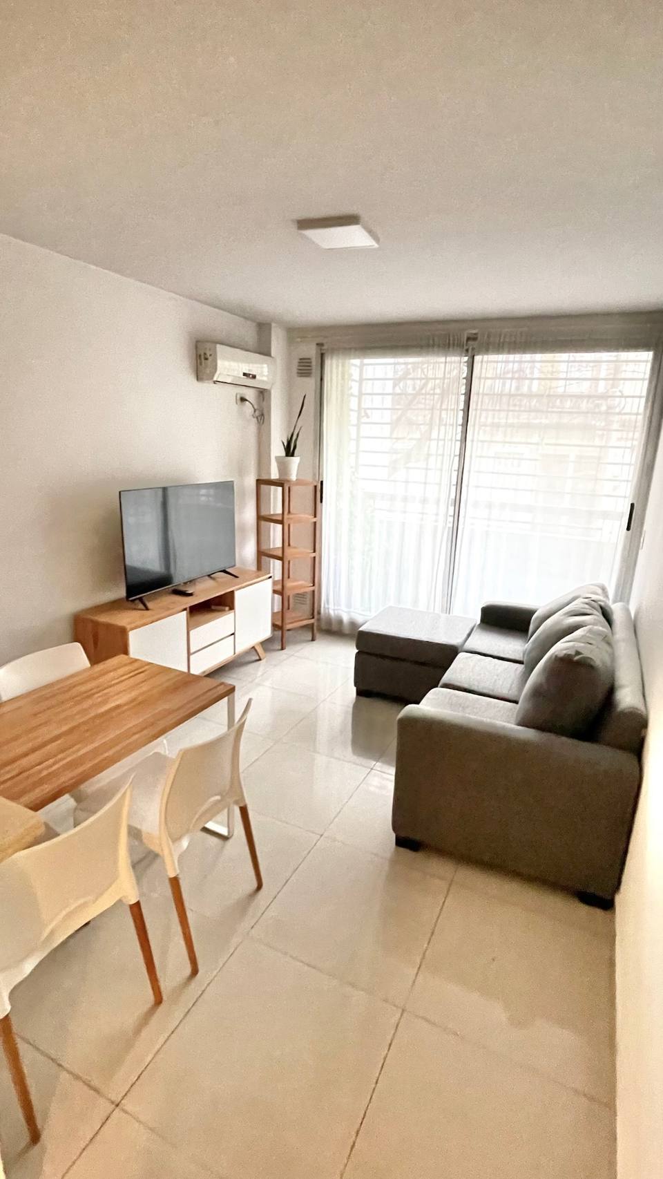 Spacious living-dining room with balcony access