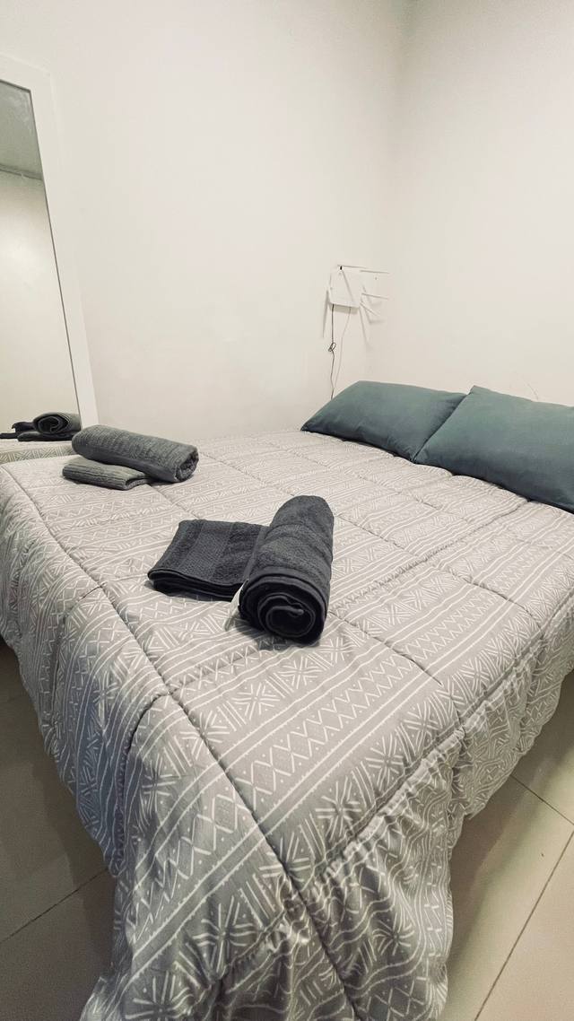 Master bedroom with double bed and welcome details
