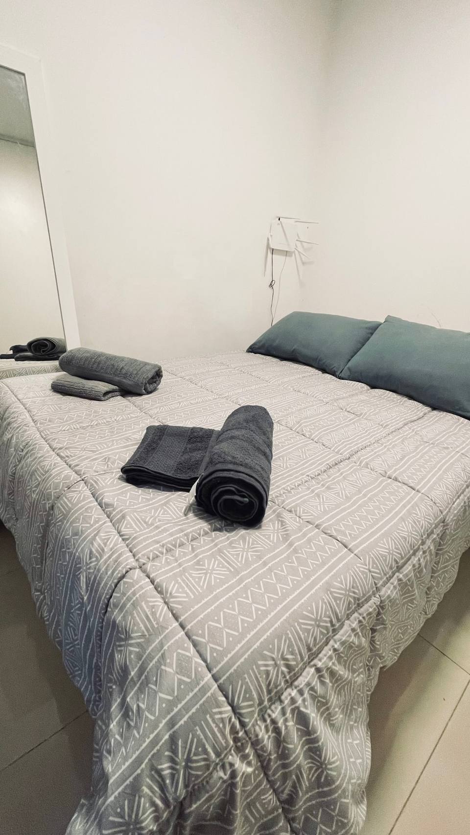 Master bedroom with double bed and welcome details