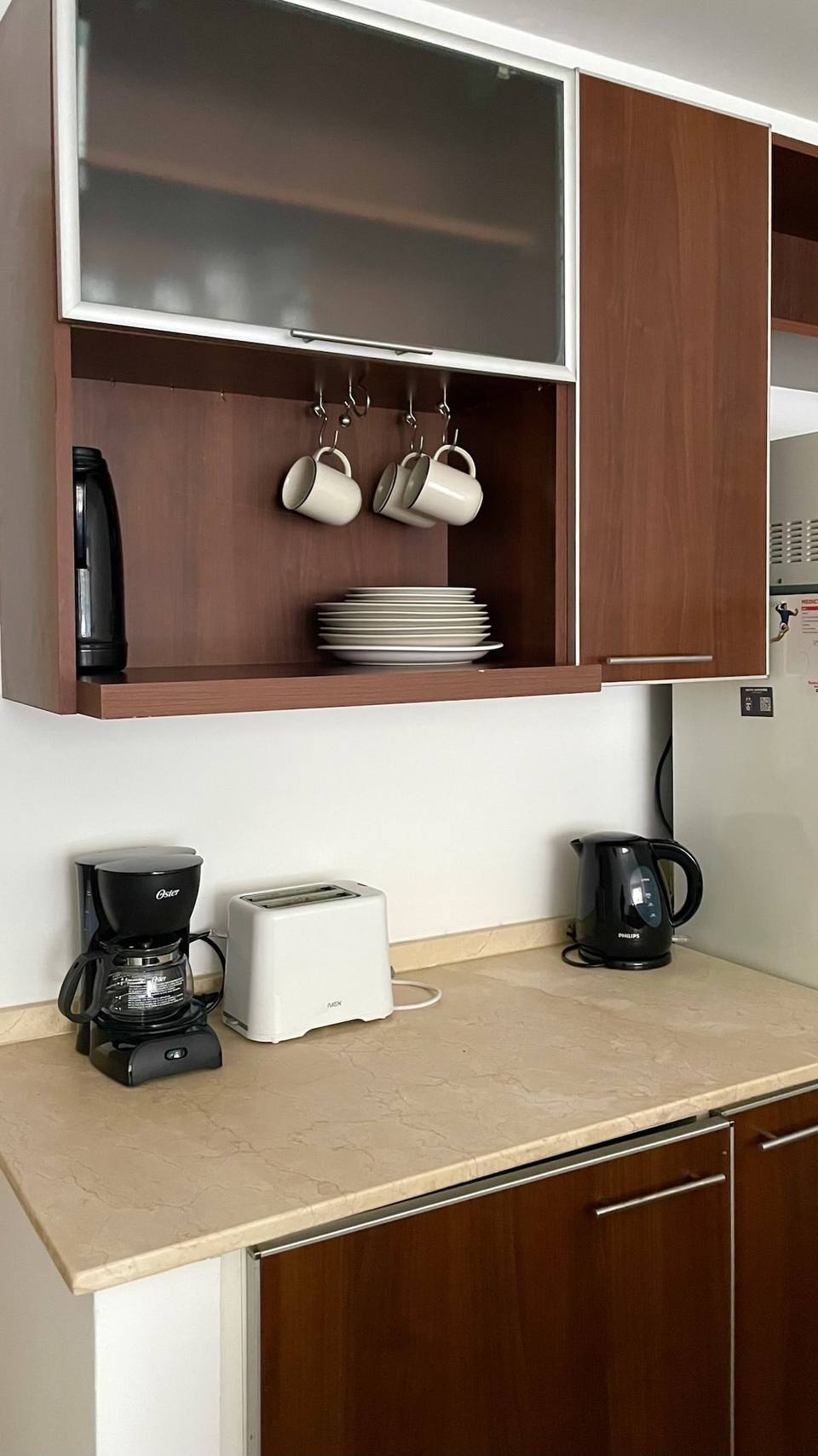 Kitchen equipment: coffee maker, toaster, and electric kettle